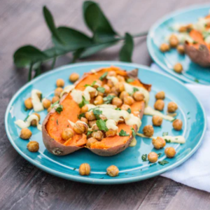 Roasted sweet potato with coconut cream, chickpeas, vegetables